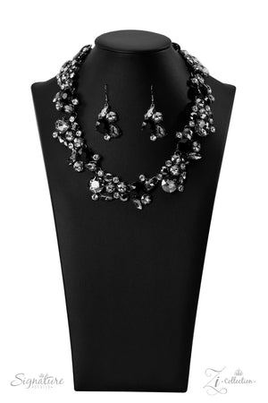 smoky gray, jet black, and sparkling white rhinestones gather into haphazard clusters that link fearlessly along the collar