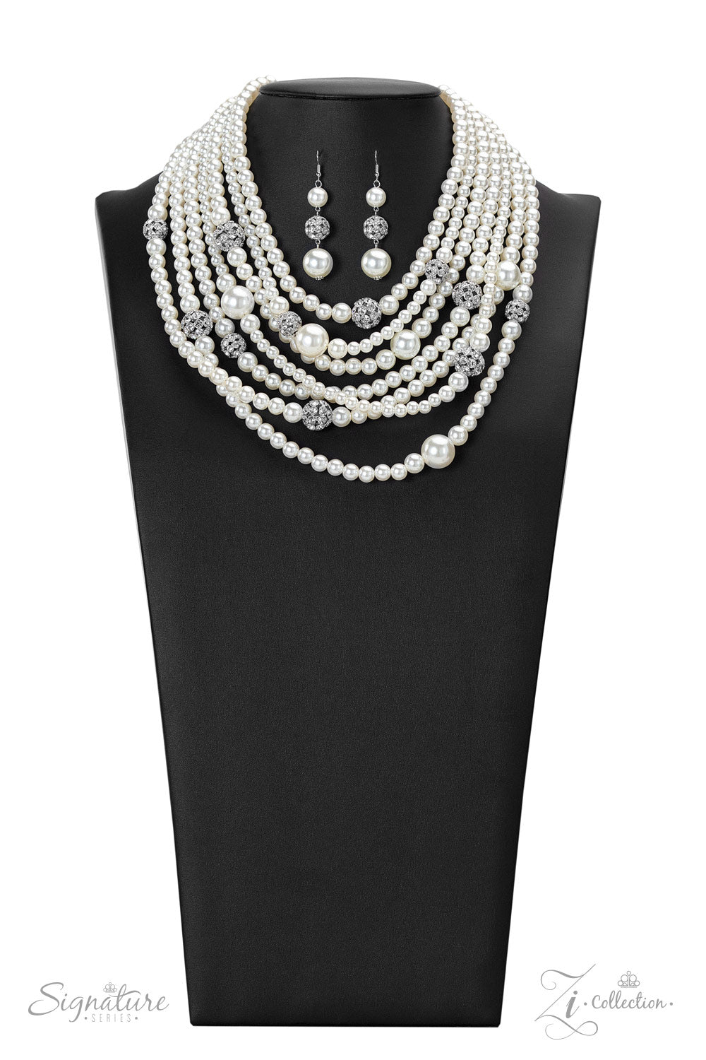 Strand after strand of lustrous white pearls layer down the chest, creating timeless tiers. Airy silver spheres, adorned in sparkling white rhinestones