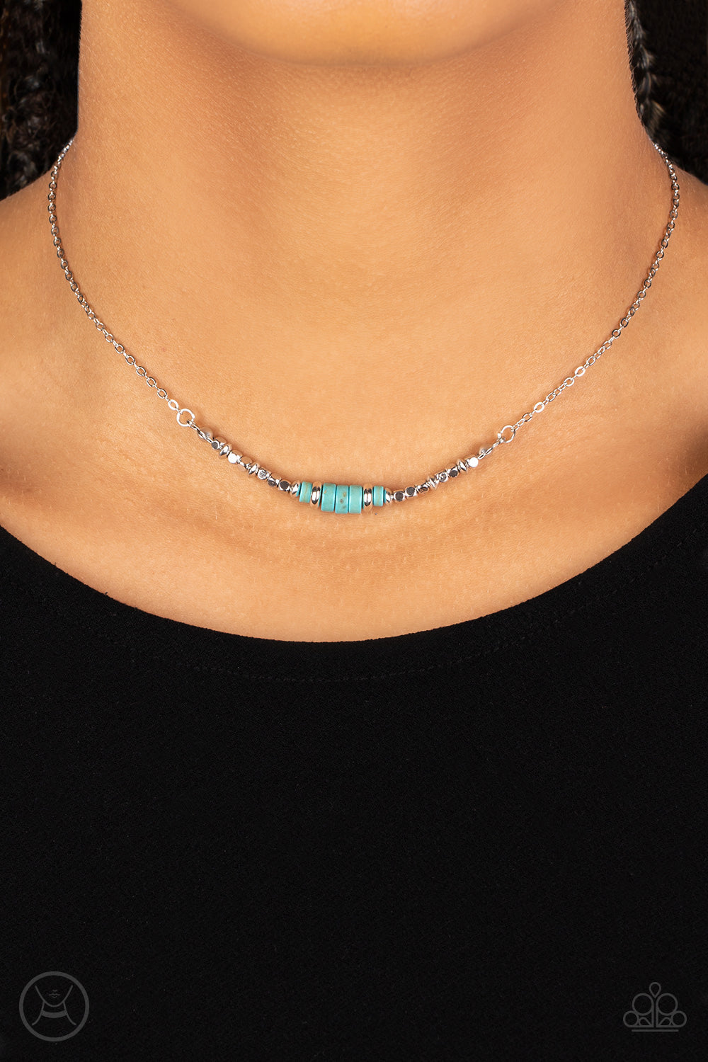 trio of earthy turquoise stone discs is flanked by square silver beads threaded along a dainty silver chain
